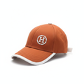 Hermès orange H cap 45 right angle