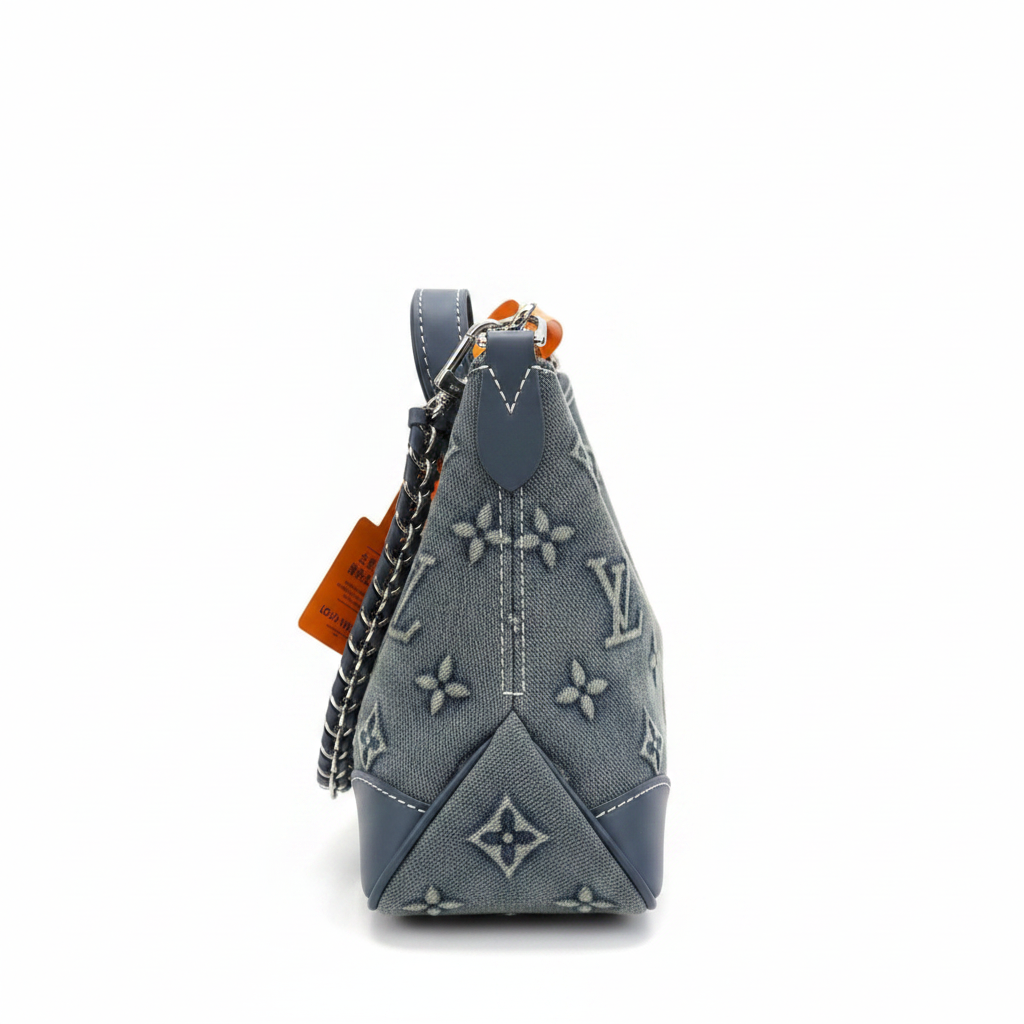 Left side view - Louis Vuitton denim monogram handbag